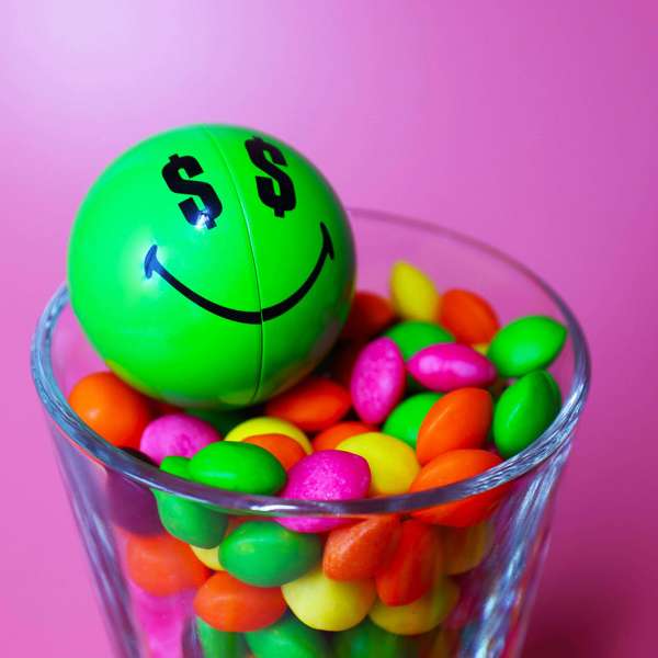 Green Smiley Halves in a glass of sweets